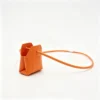 TinyTote orange mini PU leather handbag pouch with top handle TinyTote OEM Mini PU Leather Handbag Pouch with Crossbody Strap