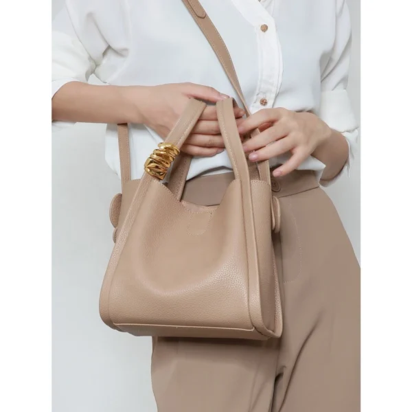 Women Pebbled Leather Decorative Metal Knot Bucket Tote Bag