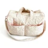 FloralQuilt Ditsy Floral Quilted Weekender Bag, Cotton Travel Duffel with Pink Piping and Shoulder Strap